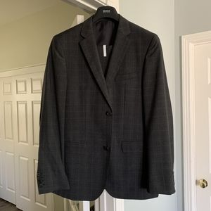HUGO BOSS suit. Dark grey. 40R. New